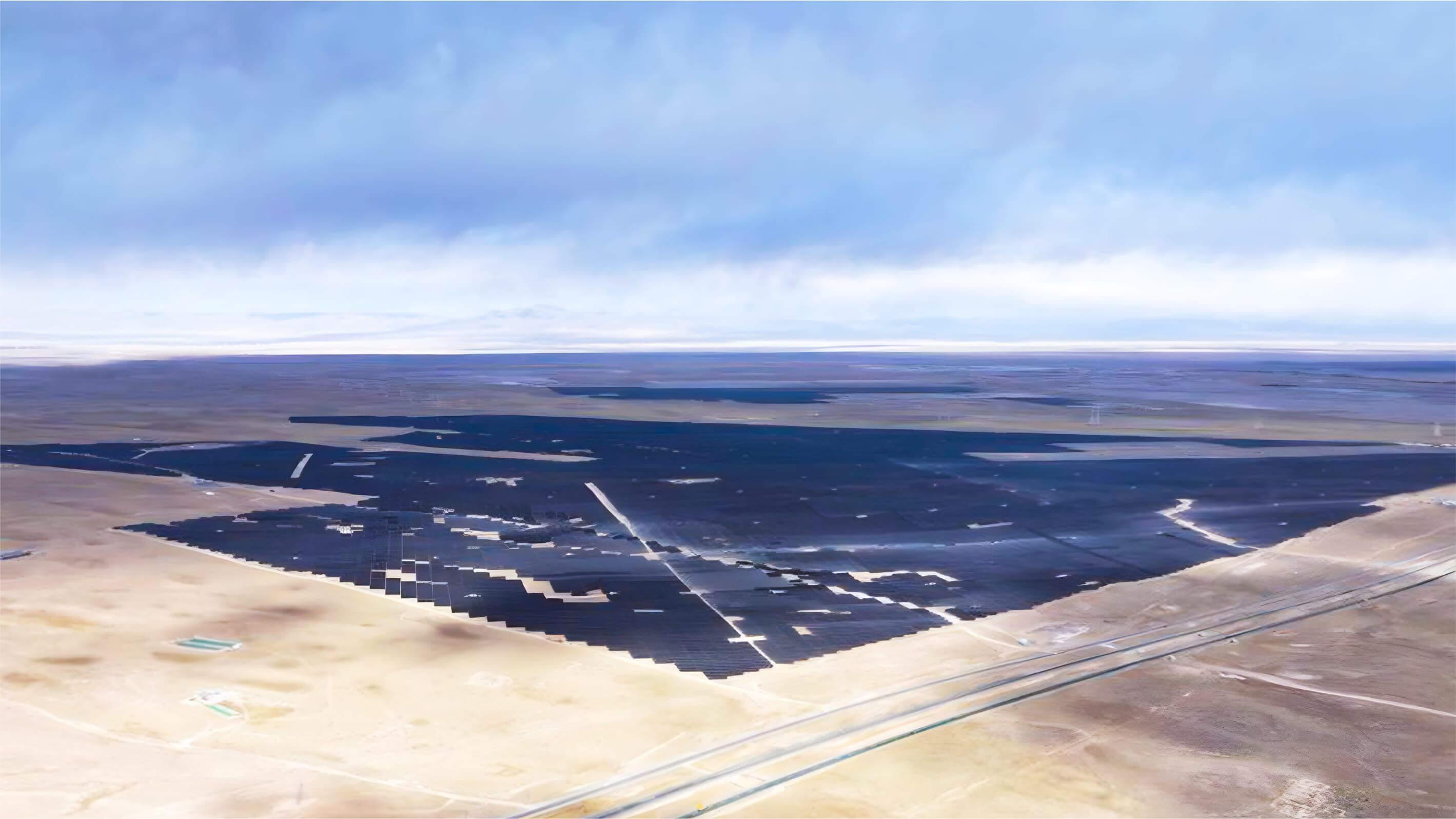 Aerial view of utility-scale Trina Solar installation in desert terrain